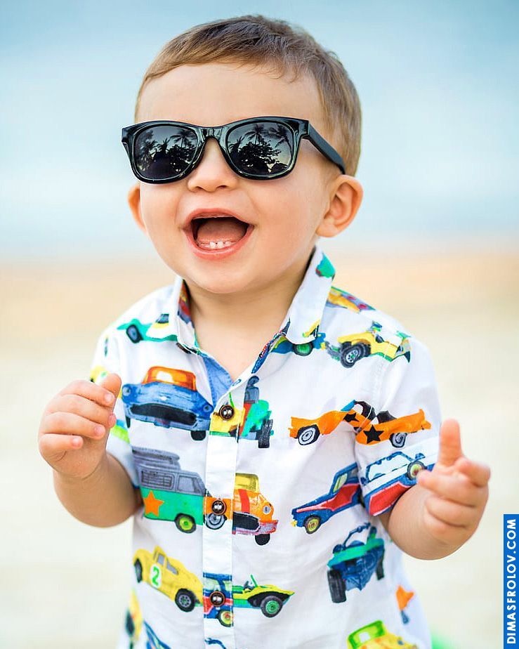 Cool baby portrait on the beach — stylish and playful kids photo shoot